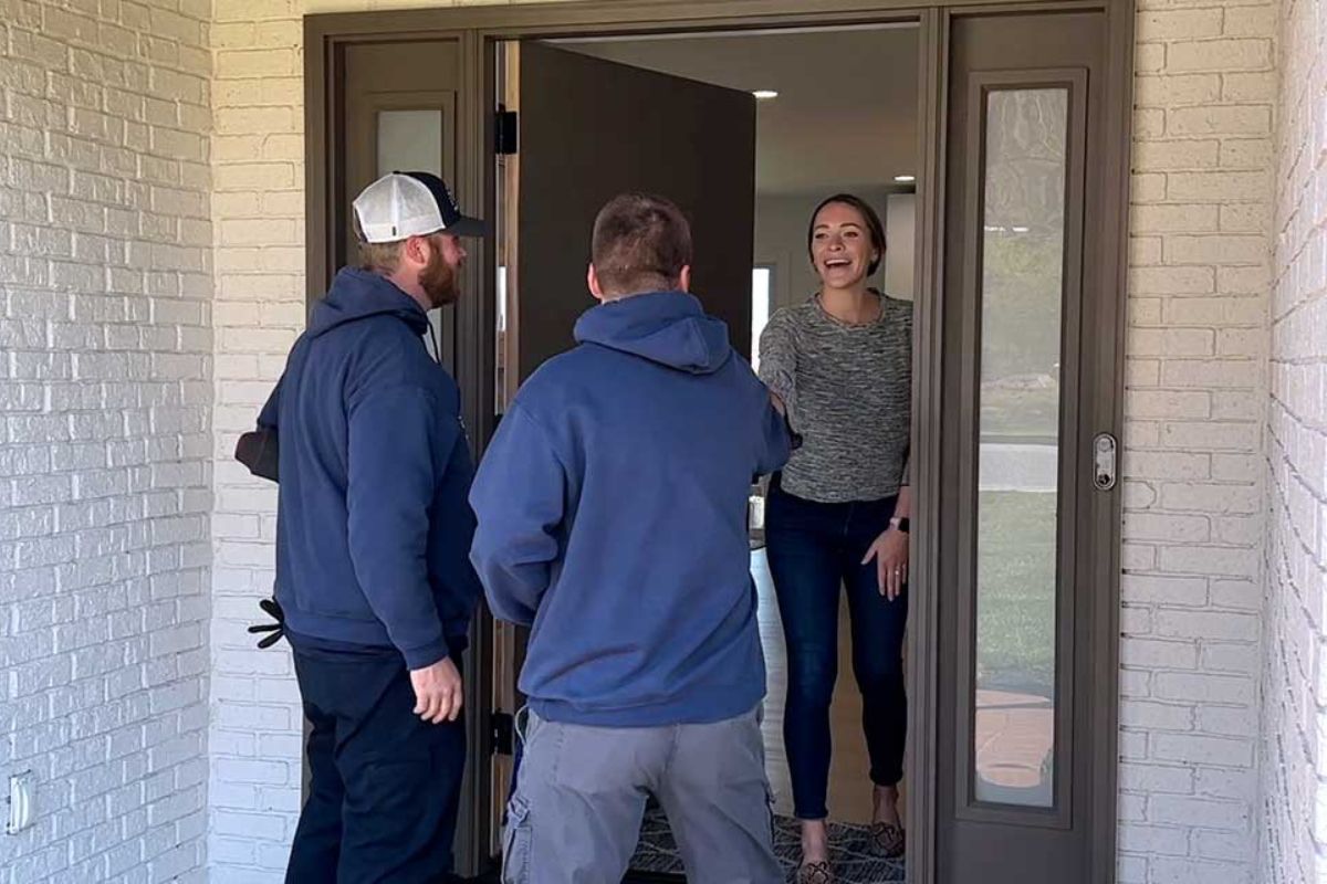 A photo of a client meeting her movers and how much do movers cost in Harrisburg, PA